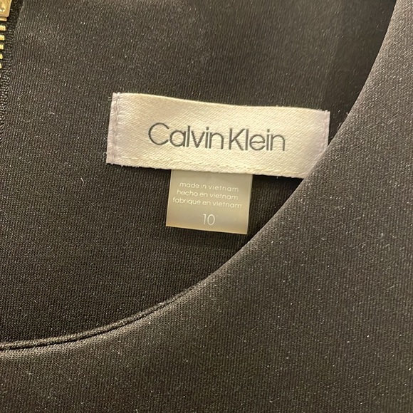 Calvin Klein black tie dress size 10 so cute with pockets.Sleeveless. Worn once - Picture 2 of 5